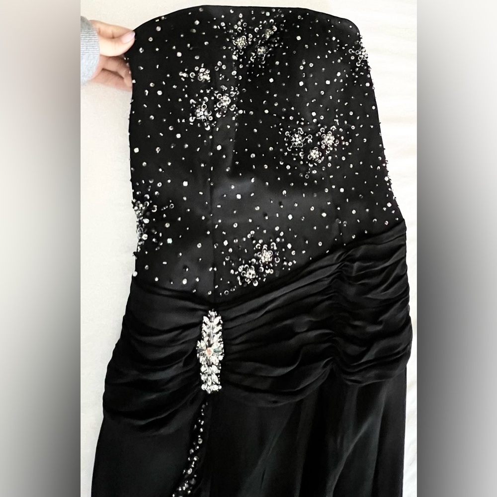 Black beaded strapless formal gown